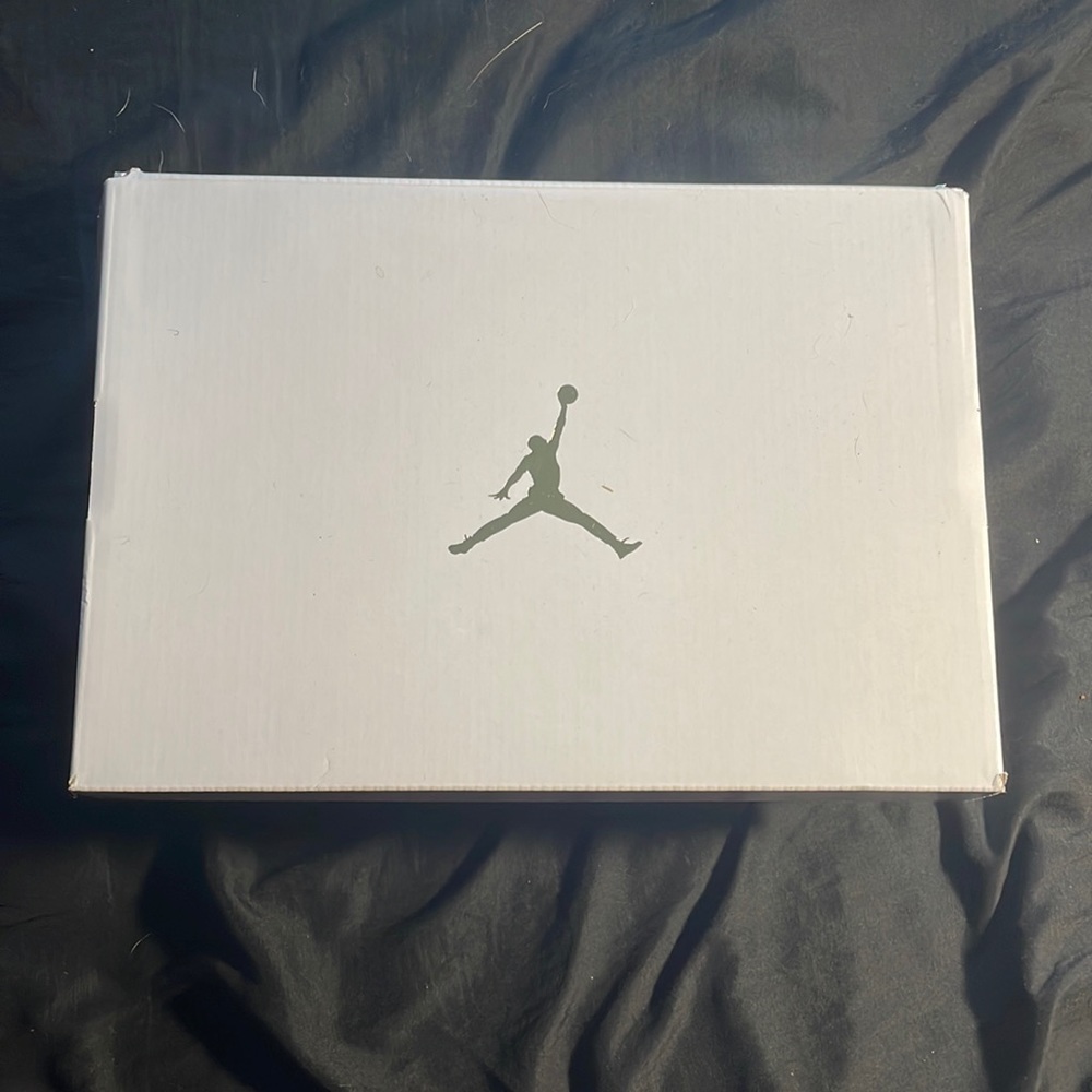 These are White, red, and blue Air Jordan 1s